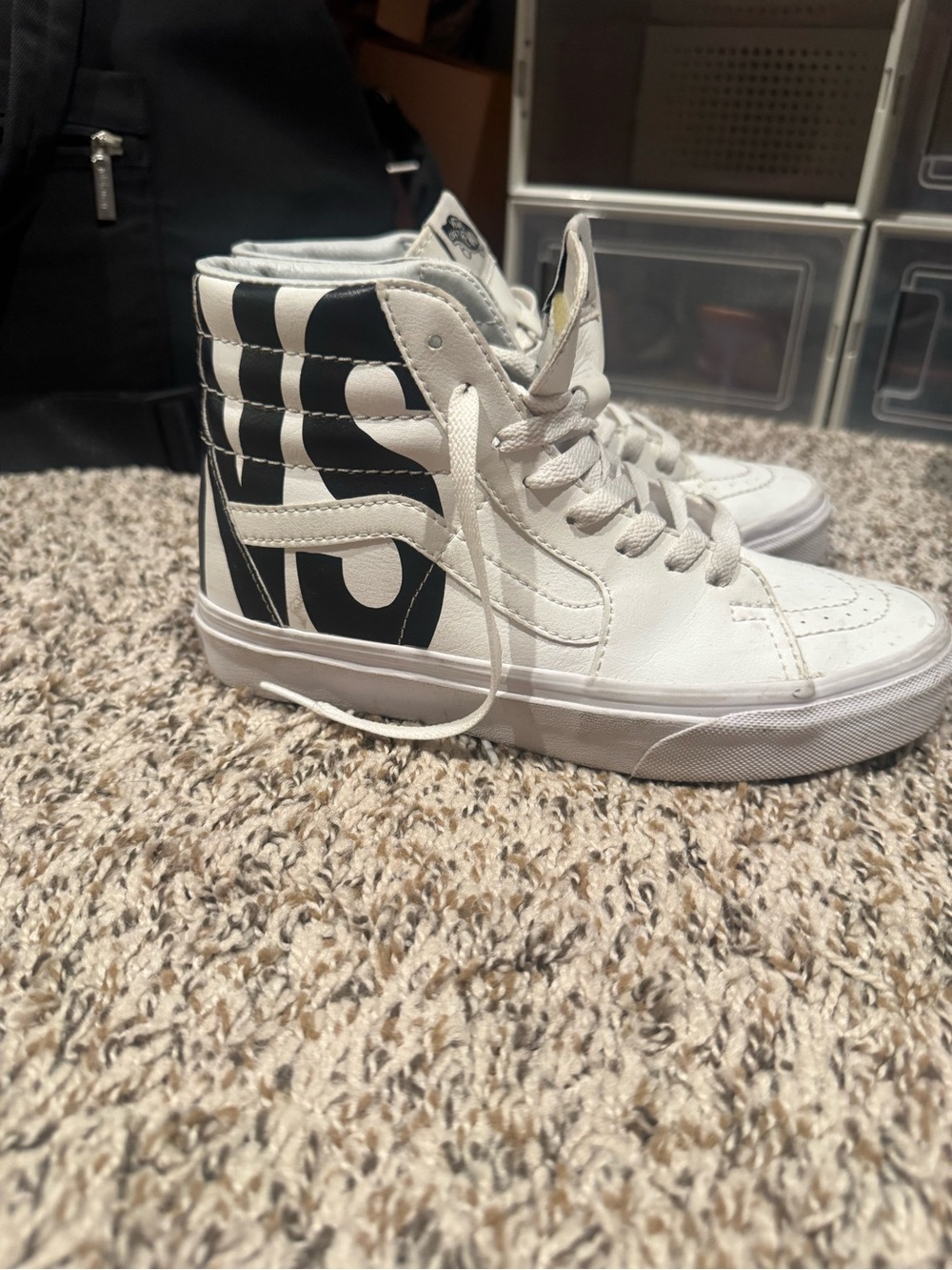 Vans women Sk8-Hi High Top Sneakers in White with Black Graphic